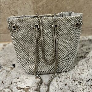 Diamond embezzled bucket mini bag with silver chain